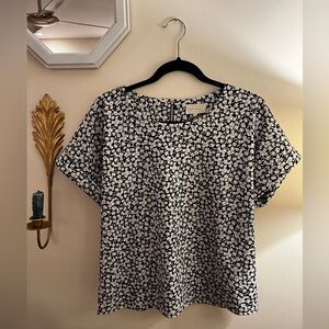 Floral patterned top with cuffed sleeves